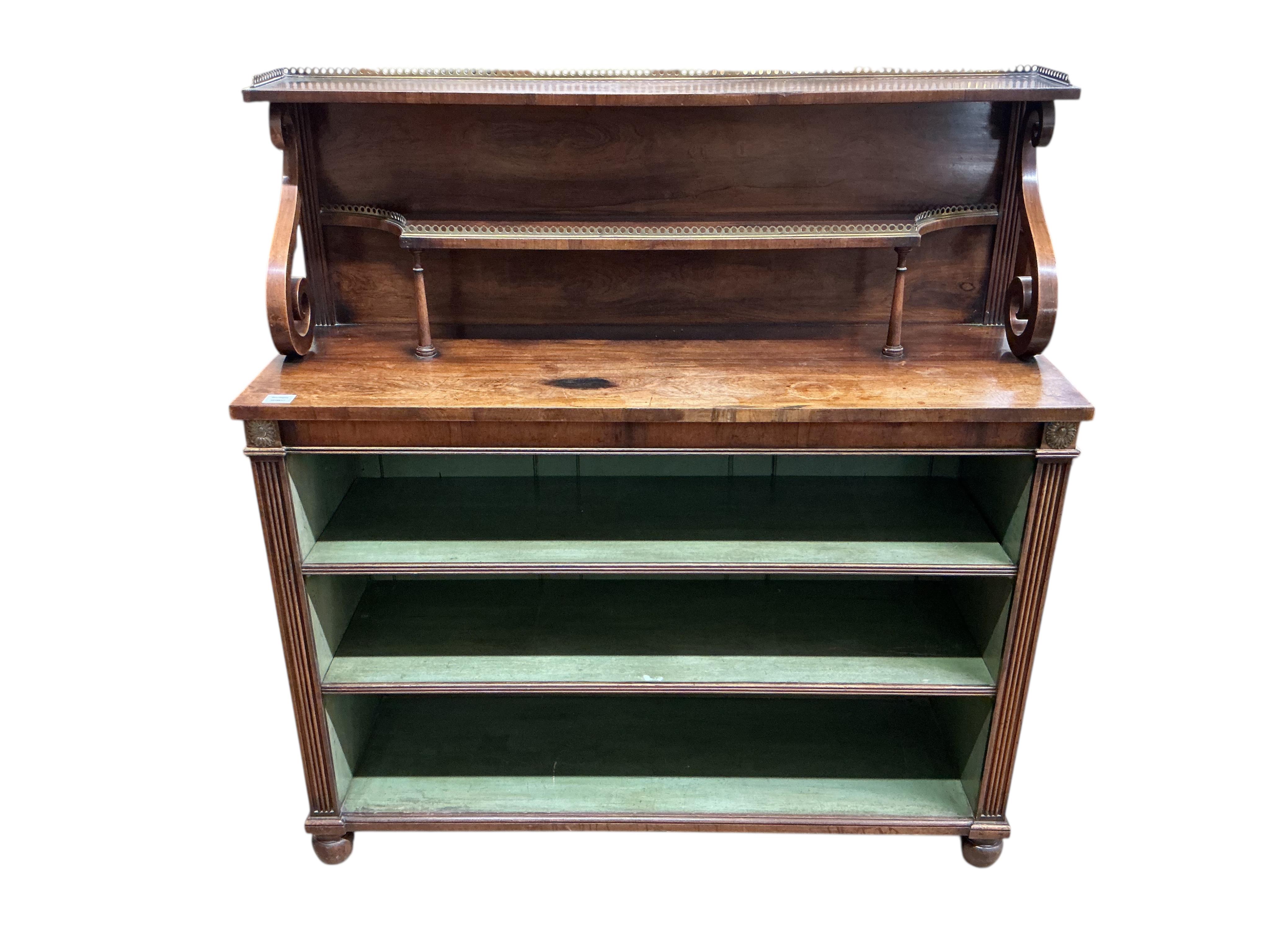 A Regency rosewood and brass mounted side cabinet, width 124cm, depth 41cm, height 132cm